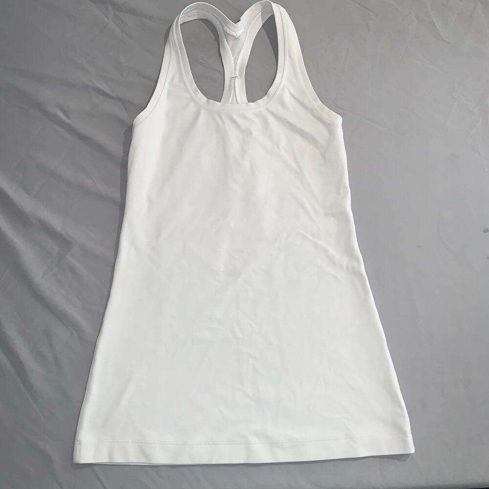 Lululemon women’s racerback tank top in white.